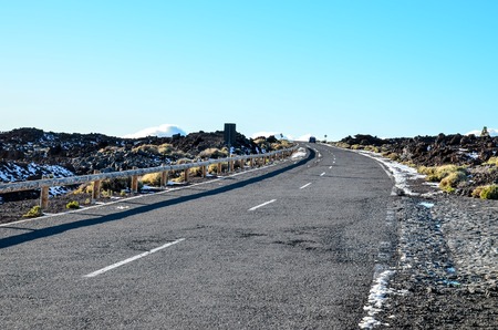 Long Empty Desert Asphalt Road in Canary Islands Spainの写真素材