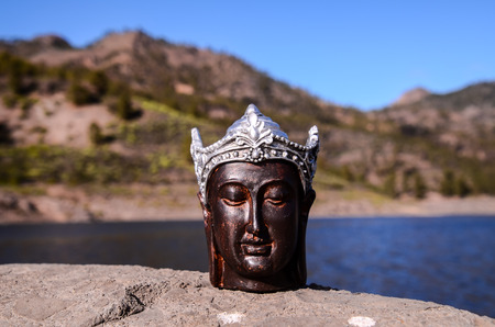 One Ancient Buddha Statue Near The Oceanの写真素材