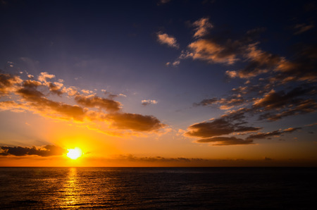 Sun Setting on the Atlantic Ocean in Tenerife Canary Island Spainの写真素材