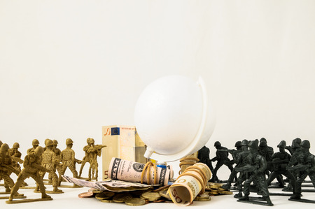 Plastic Lead Soldiers Representing War on a White Backgroundの写真素材