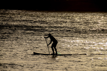Silhouette Surfer at Sunset in Tenerife Canary Island Spainの写真素材