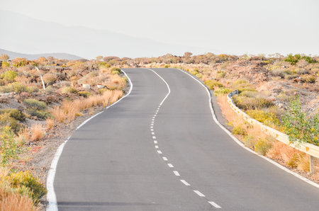 Long Empty Desert Asphalt Road in El Hierro Canary Islands Spain