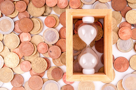 Picture of a Business Money Concept Idea, Clock and Coins