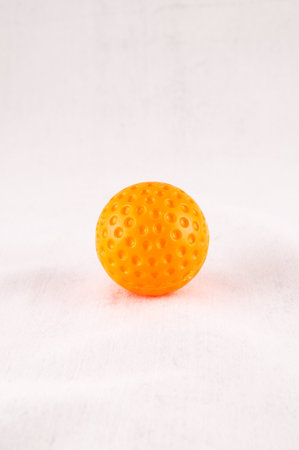 Classic Style Round Golf Ball Textured Sphereの写真素材