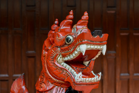 Picture of a Classic Thai Wooden Dragon Statueの写真素材