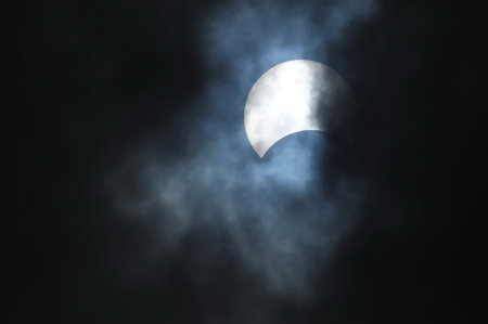 Partial Solar Eclipse on a Cloudy Day 03.11.2013の写真素材