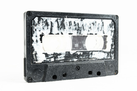 Ancient Vintage Used Musicassette over a White Backgroundの写真素材
