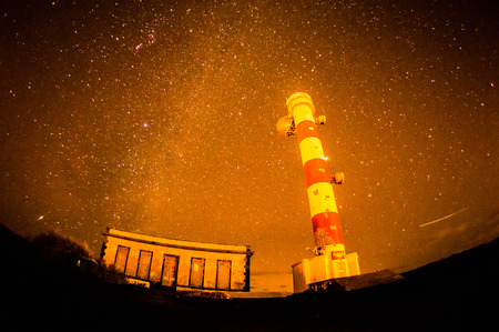 Night Sky Picture of a Lighthouse Towerの写真素材
