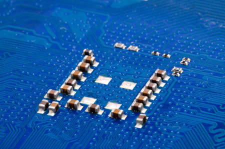 Macro Photo Of Electronic Circuit. Pcb On The Lighting.