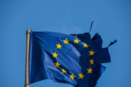 Old European Flag on a Blue Skyの写真素材