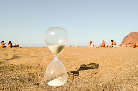 Photo Picture of Hourglass Clock on the Sand Beach