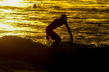 Silhouette Surfer at Sunset in Tenerife Canary Island Spainの写真素材