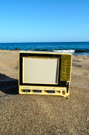 Photo Picture of a Television on the Sand Beachの写真素材