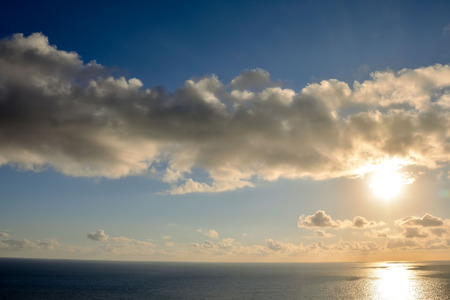 Photo Picture of The  Sun Setting in the Seaの写真素材