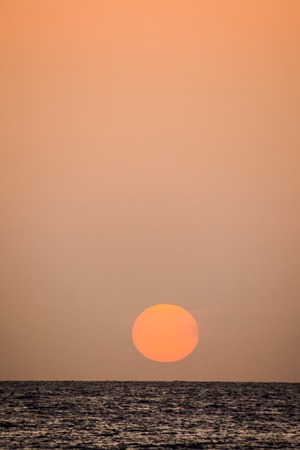 Sun Setting on the Atlantic Ocean in Tenerife Canary Island Spainの写真素材