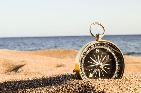 Photo Picture of  a Compass on the Sand Beachの写真素材