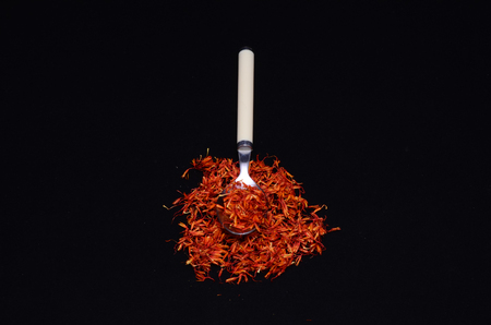 Saffron Flower Spice On a Black Backgroundの写真素材