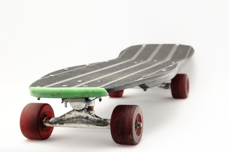 Vintage Style Black Skateboard on a white Backgroundの写真素材