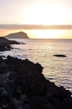 Sun Setting on the Atlantic Ocean in Tenerife Canary Island Spainの写真素材