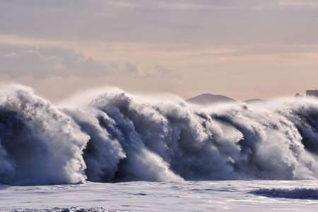 Rough Sea with Large Waves Breaking on the Coastの写真素材
