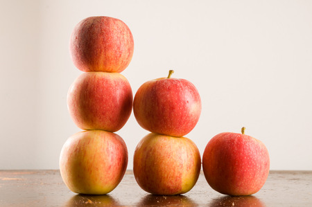 background with fresh red applesの写真素材