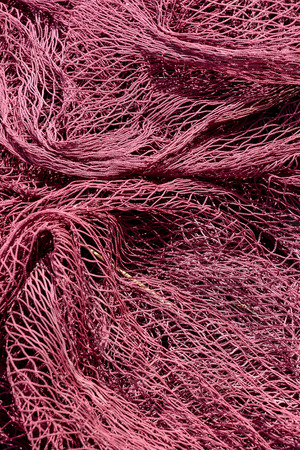 Photo Picture Close up view of colored fishing netの写真素材