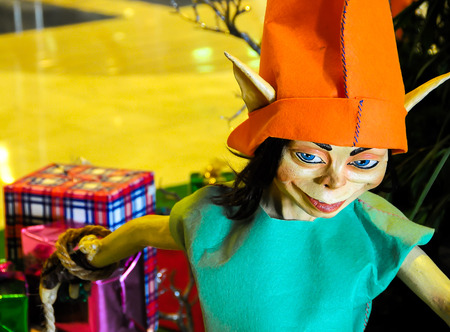 Modern Statue of a Christmas Elf with Giftsの写真素材