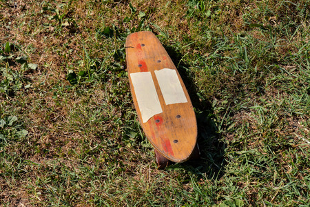 Photo picture of a Wooden 70's skate board skateboardの写真素材