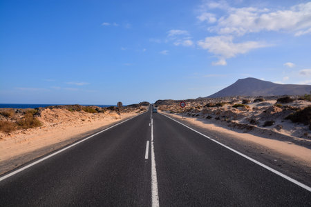 Long Empty Desert Asphalt Road in Canary Islands Spain
