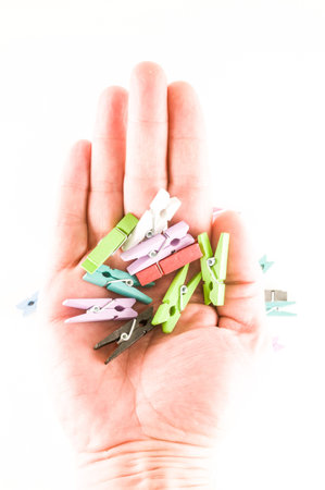 Photo picture of multicolored clothespin background texture