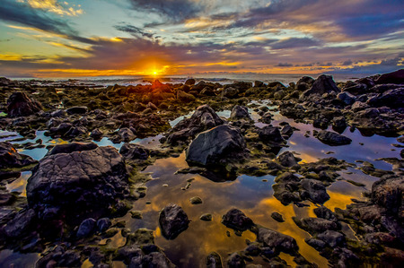 Sun Setting on the Atlantic Ocean in Tenerife Canary Island Spainの写真素材