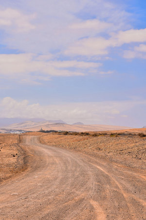 Photo Picture of a Dirt road leading off into the desert