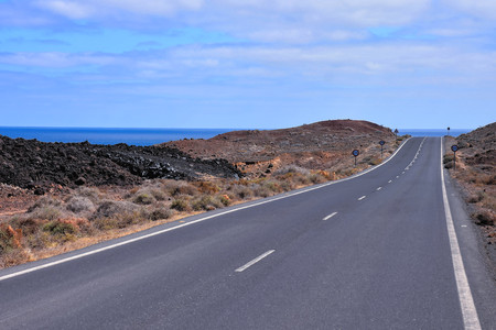 Long Empty Desert Asphalt Road in Canary Islands Spainの写真素材