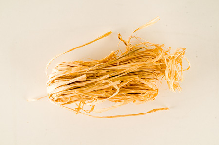 Closeup of golden round hay texture backgroundの写真素材