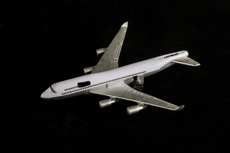 Close-up of toy airplane Object on a black Backgroundの写真素材