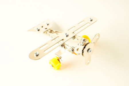 Photo picture of a Small toy metal plane airplaneの写真素材