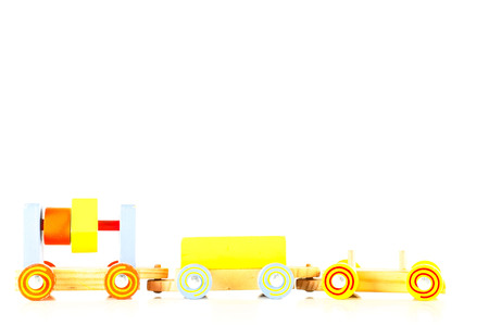 Close-up of wooden toy train Object on a White Backgroundの写真素材
