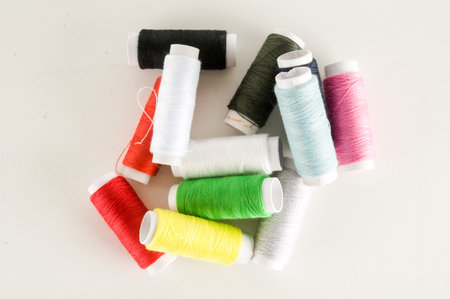 Photo Picture of Colored sewing thread wire background