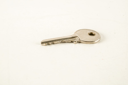 Close-up of door lock key Object on a White Backgroundの写真素材
