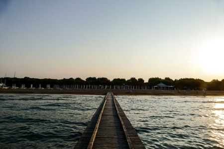 Pier Beach of Lido di Jesolo at adriatic Sea in a beautiful summer day Italyの写真素材