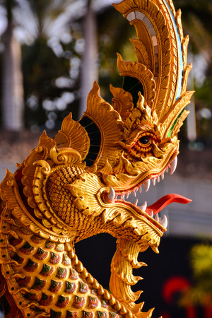 Old oriental buddhist Statue Carvings thai artの写真素材