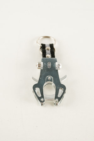 Metal aluminum snap hook isolated background Safety lock carabiner for rope climbing