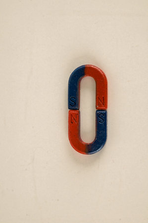 Close-up of red and blue magnet Object on a White Background