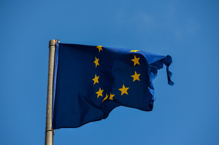 Old European Flag on a Blue Skyの写真素材