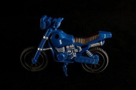 Close-up of cross motorbike motorcycle toy Object on a black Background