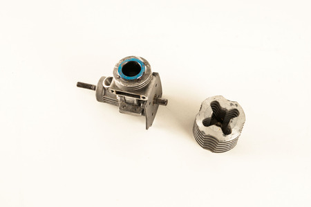 Photo of Rc helicopter engine on white backgroundの写真素材