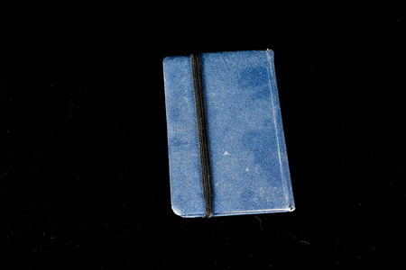 Close-up of note book Object on a Black Backgroundの写真素材