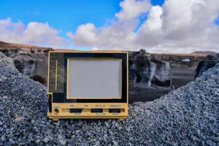 Conceptual Photo Picture of a Television Object in the Dry Desertの写真素材