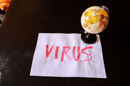 Word Virus Text Writed with Blood on a White Paperの写真素材