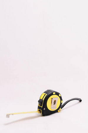 yellow tape measure isolated on white background